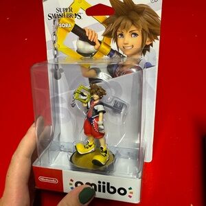 Nintendo Amiibo Packaging with Red and White Accents